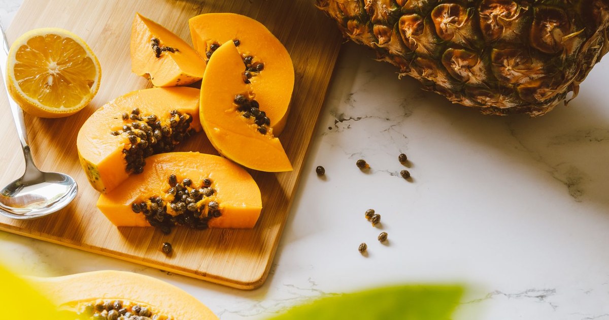 Fresh pineapple and papaya, natural sources of digestive enzymes