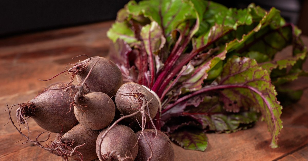 Fresh raw beetroots with green tops